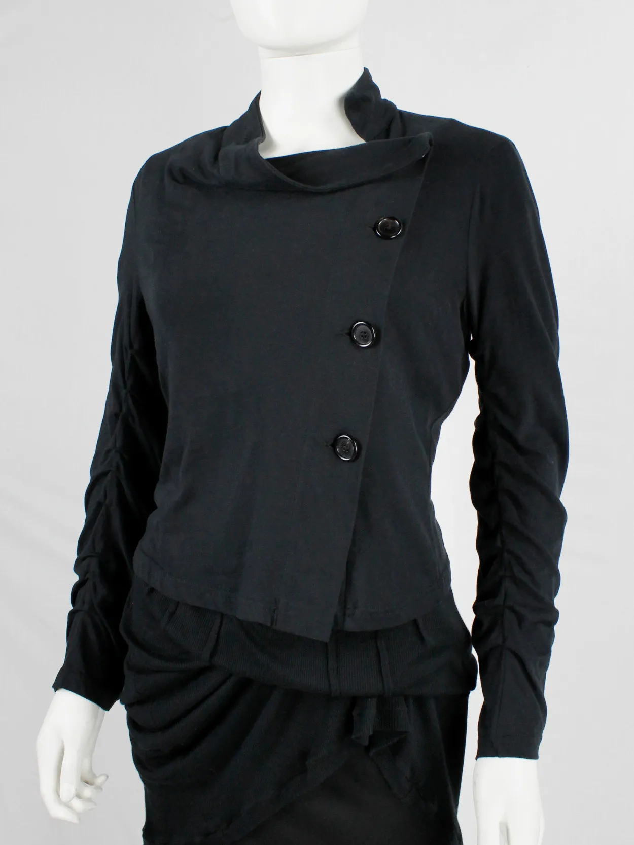 Ann Demeulemeester black asymmetric cardigan with buttons and tucked sleeves