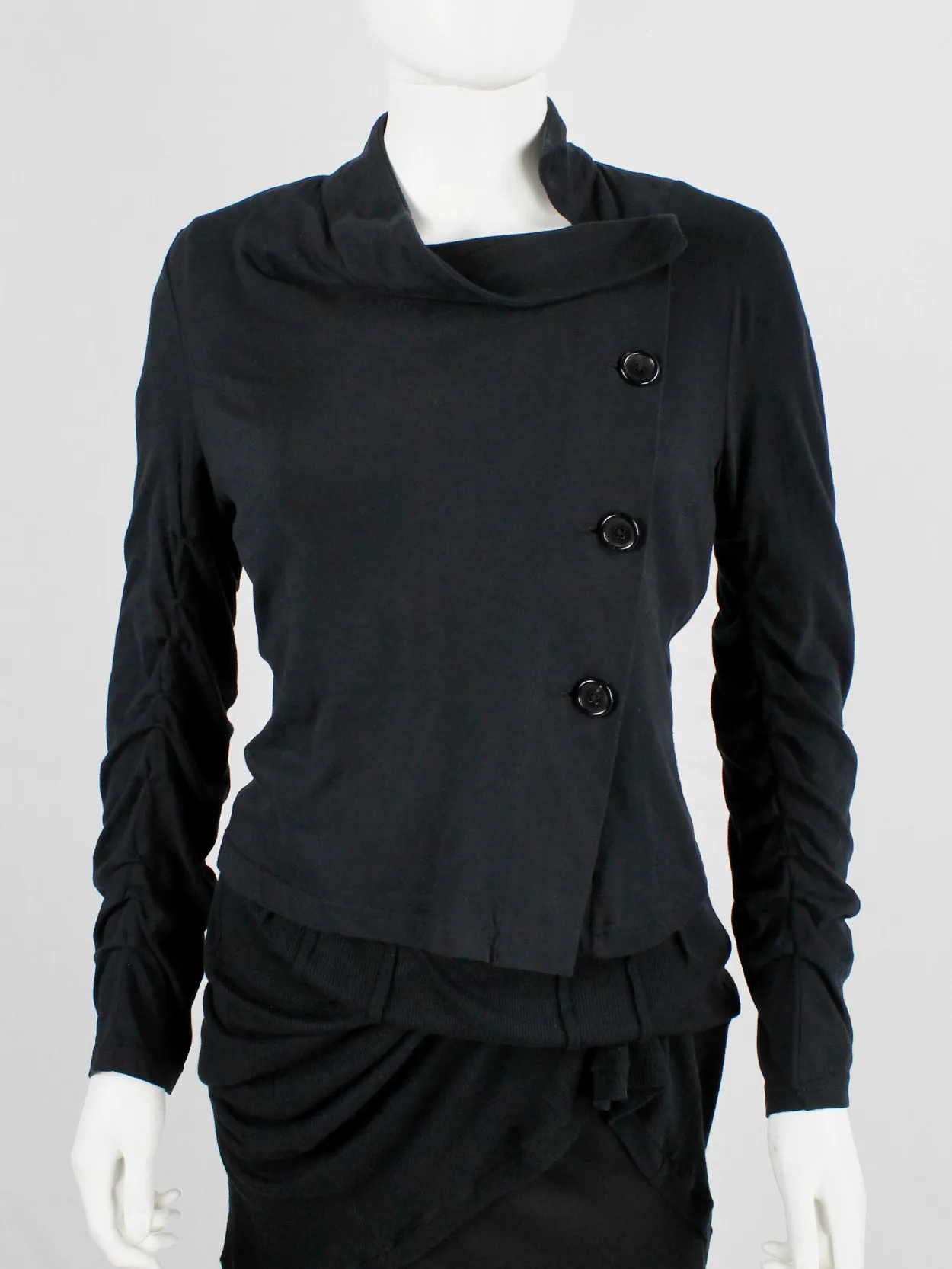 Ann Demeulemeester black asymmetric cardigan with buttons and tucked sleeves