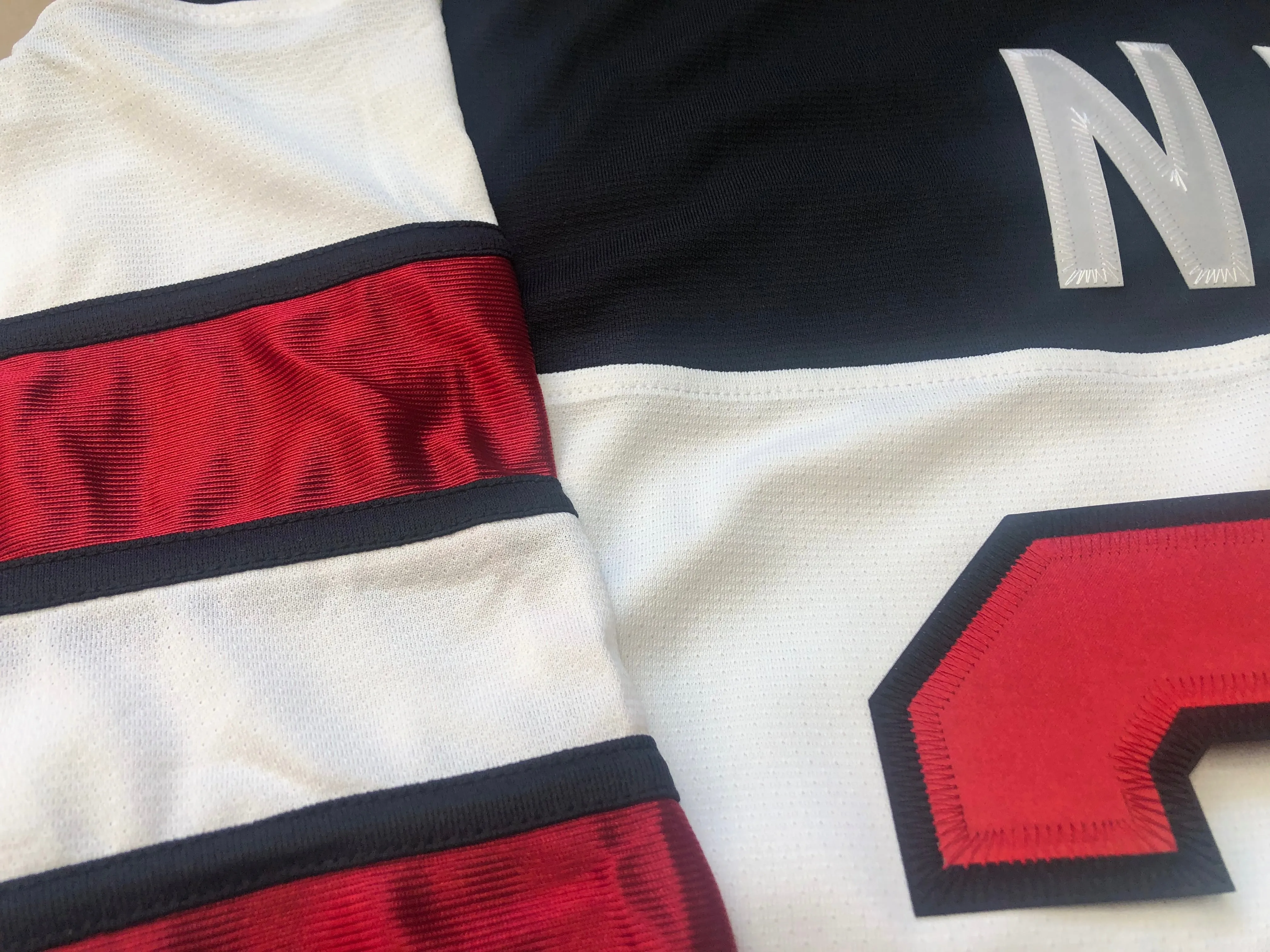 Custom Hockey Jerseys with the Cougar Hunters Embroidered Twill Logo