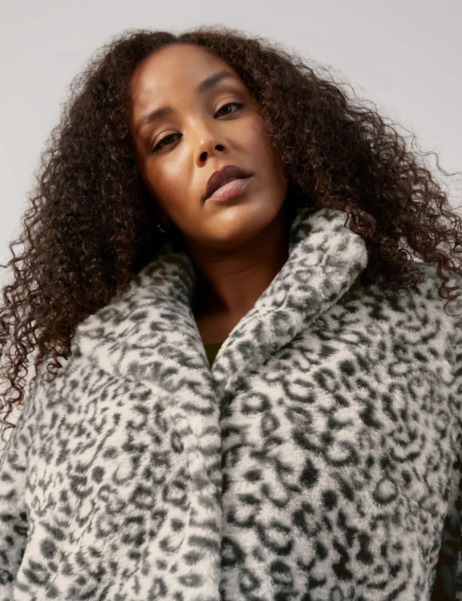 Faux fur coat with a leopard print pattern