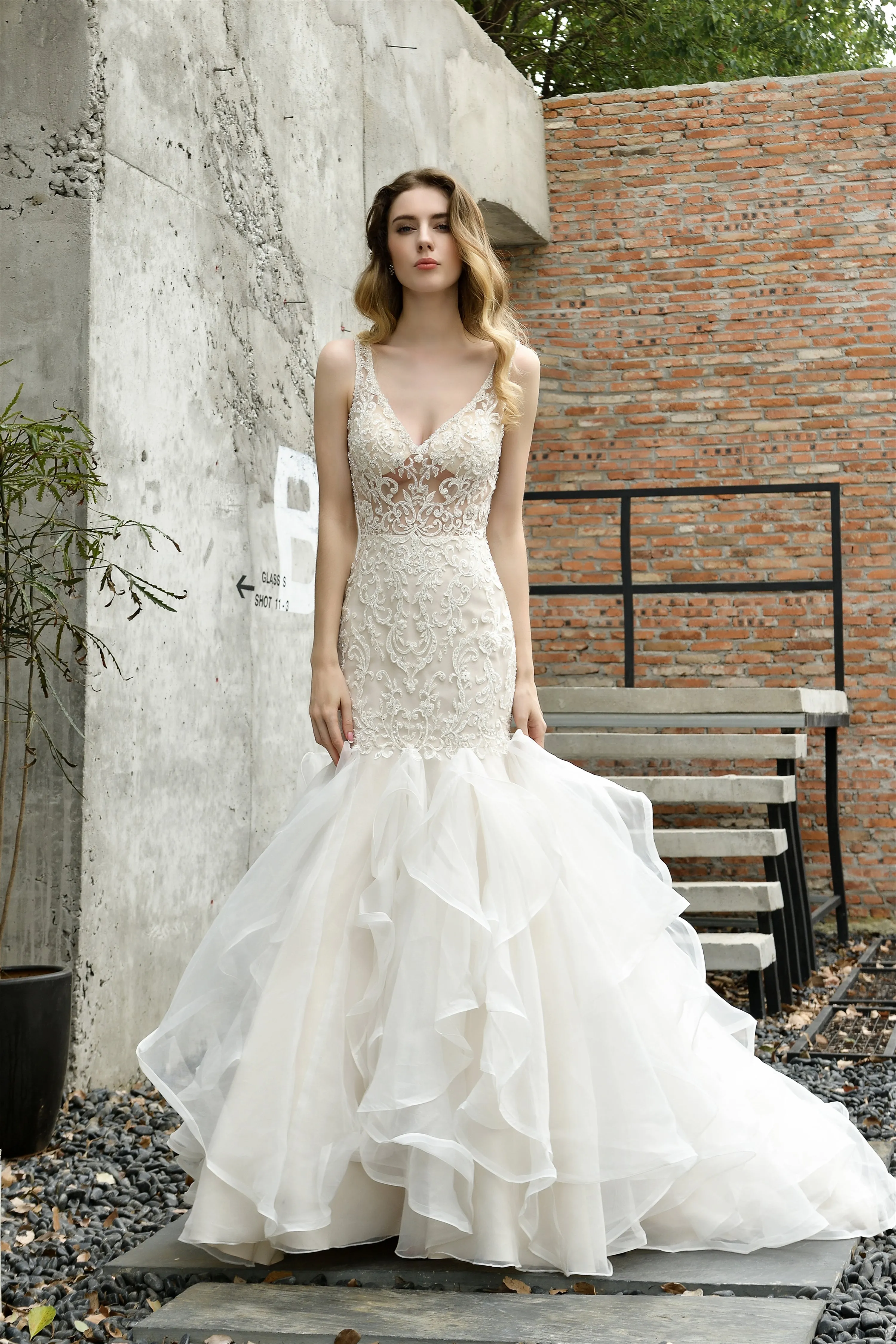 Mermaid Sleeveless V-Neck Wedding Dresses Sweep Train Ruffles Beaded