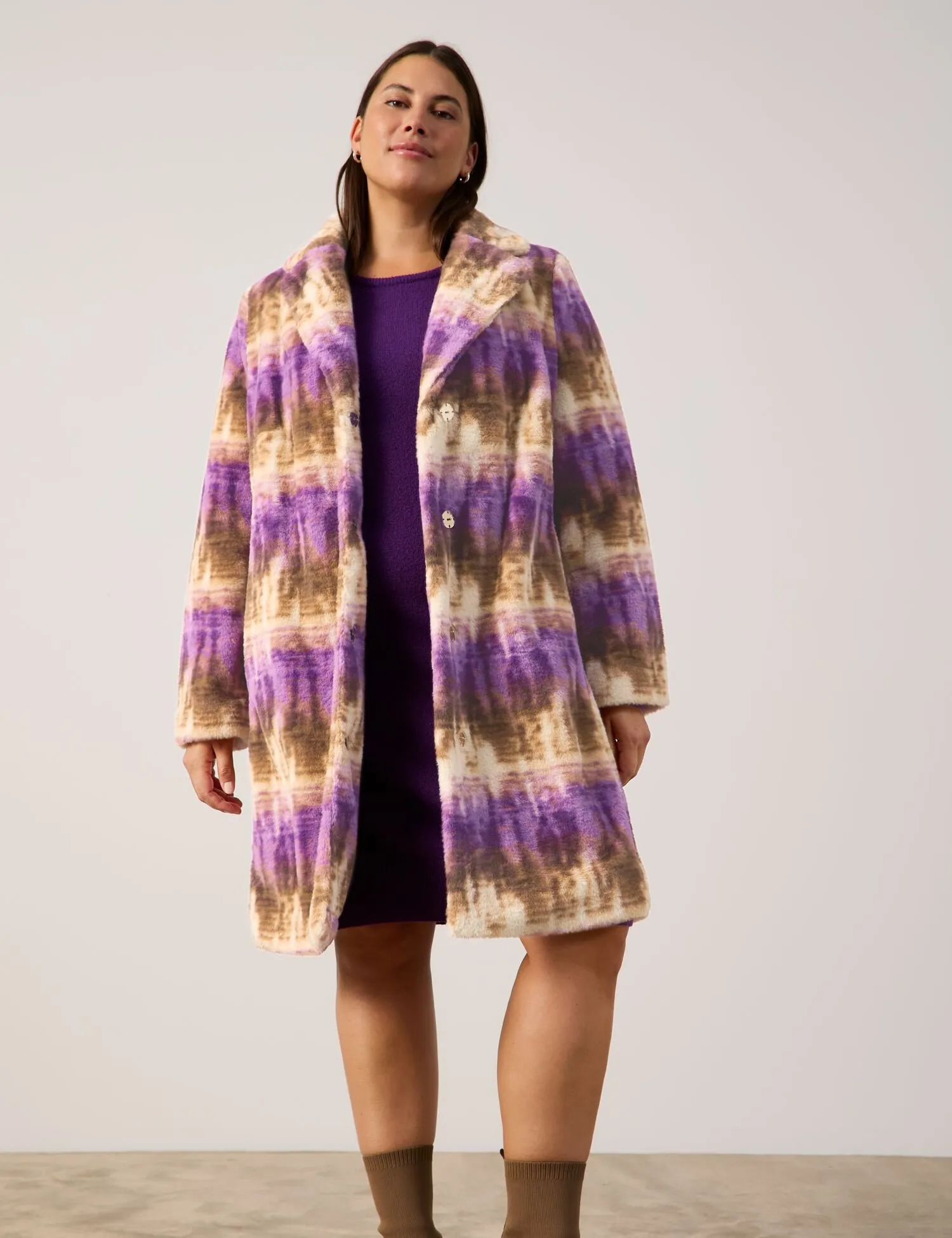 Short coat made of faux fur